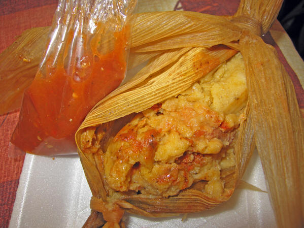 Fresh cornhusk-wrapped tamales with salsa!