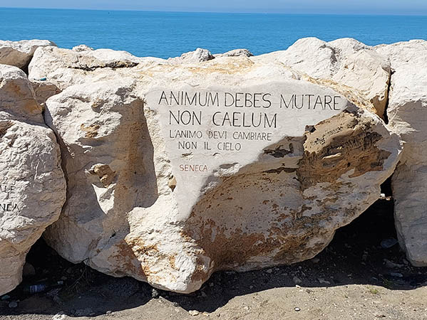 quote written by Seneca, carved into stone, port of Anzio, Italy