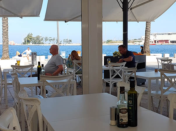 Open harbor view at Betty Cafe, Brindisi, Italy