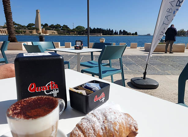 At a cafe overlooking Brindisi Harbor, Italy