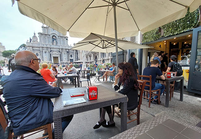 Cafe in front of St. Agatha Cathedral, Catania, Sicily