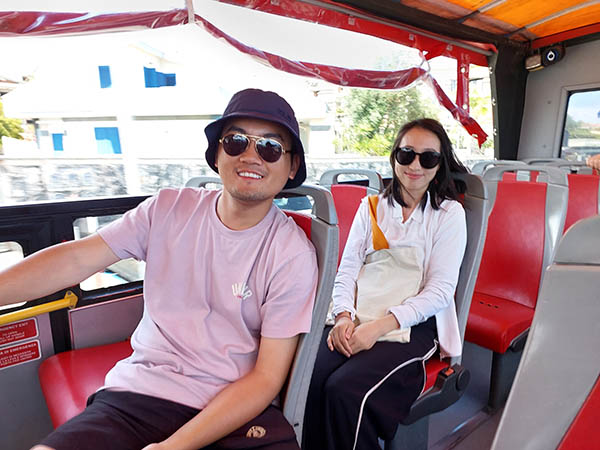 young couple on a tour bus, Catania, Sicily