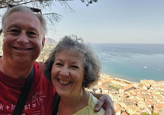 Happy Senior Couple on Rocco di Cefalu path, Sicily