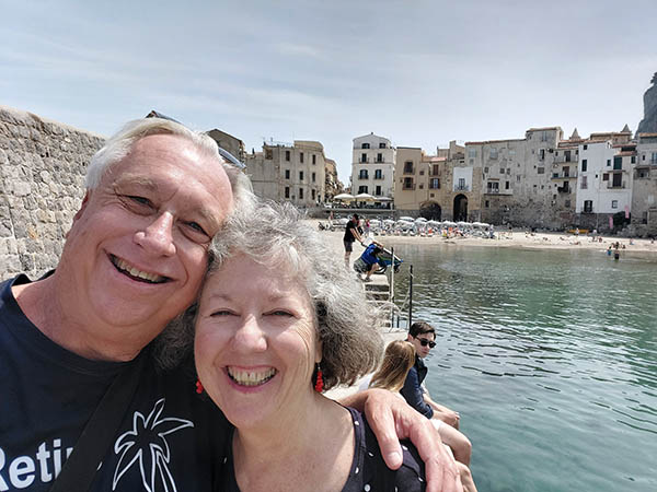 Older couple at Cefalu Beach, Cefalu, Sicily