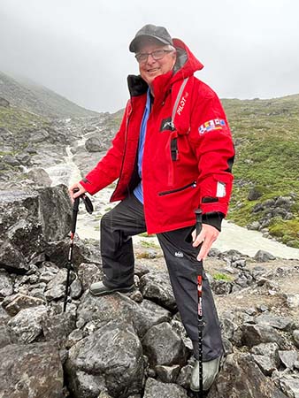 Older gentleman hiking in Greenland
