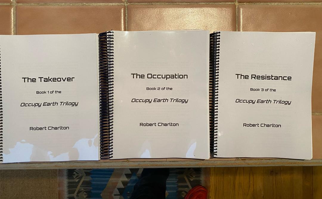 Occupy Earth Trilogy, Robert Charlton