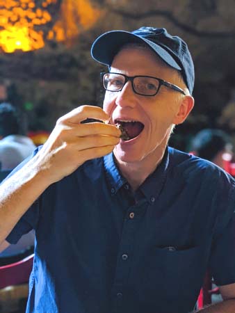 Michael eating bugs in Mexico City