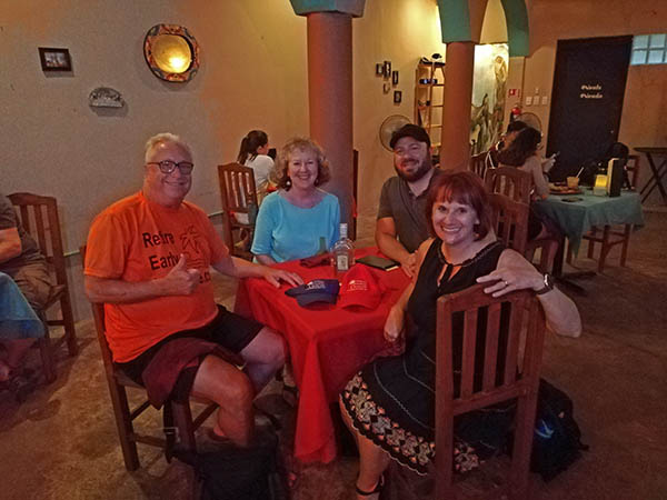 Friends eating at Javis Cantina, Isla Mujeres, Mexico