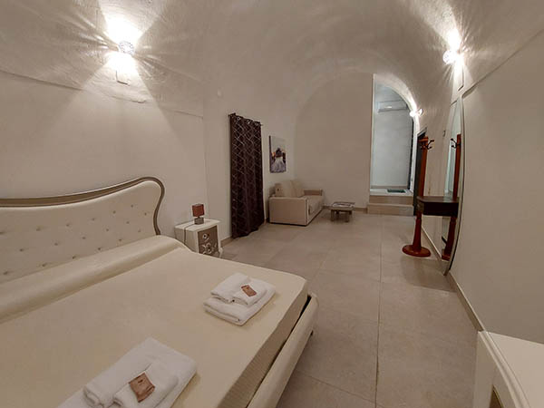 photo of the living room from the bedroom in house, Matera, Italy