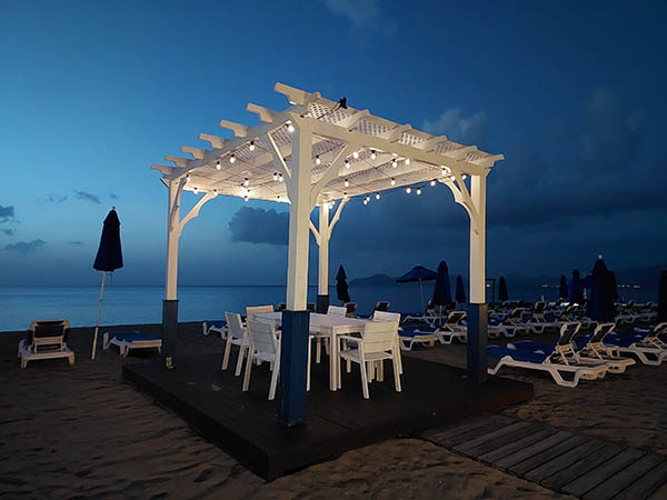 Covered platform on the beach at night at Hamilton Beach Villas and Spa, Nevis, West Indies