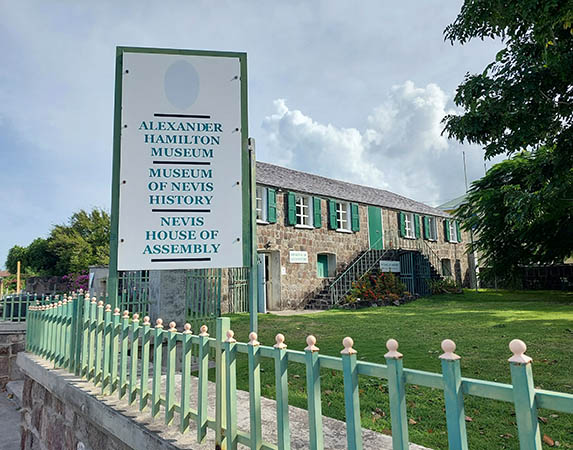 Sign designating the Alexander Hamilton Museum, Nevis history and house of assembly, Nevis, West Indies 