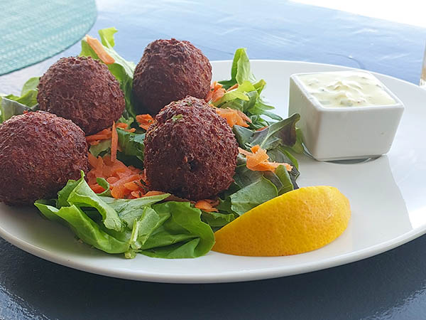 Conch fritters and tartar sauce at On The Rocks Bar and Lounge, Nevis, West Indies