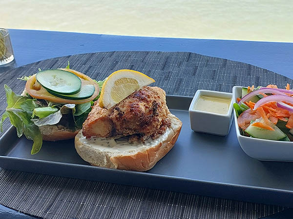 Fresh Fish Burger and salad at On The Rocks Bar and Lounge, Nevis, West Indies