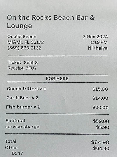 Bill for 2 people for lunch at On The Rocks Bar and Lounge, Nevis, West Indies