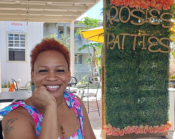 Middle aged woman at Rosie's Pattys Restaurant, Nevis, West Indies