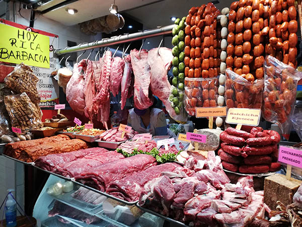 Fresh meats, handmade sausages and head cheese in Oaxaca's central market, Oaxaca, Mexico