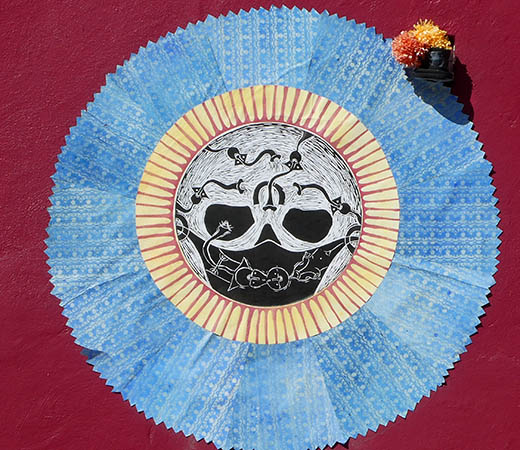 Sun and death skull, street art of Oaxaca, Mexico