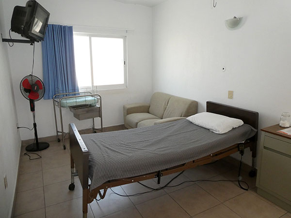 Hospital bed with room for visitors or family, CEI Clinic, Chapala, Mexico