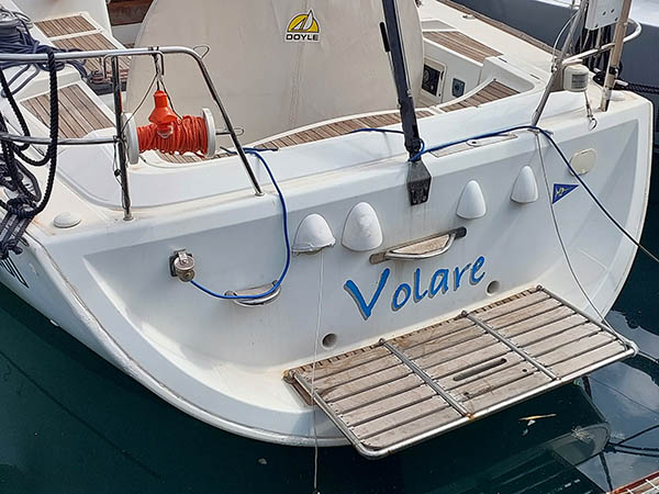 Boat named "Volare" in Palermo's harbor, Sicily