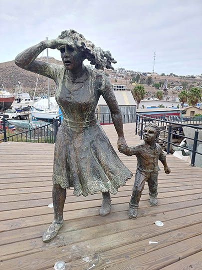 Bronze statue, woman and child at Puerto de Ensenada, Baja California, Mexico