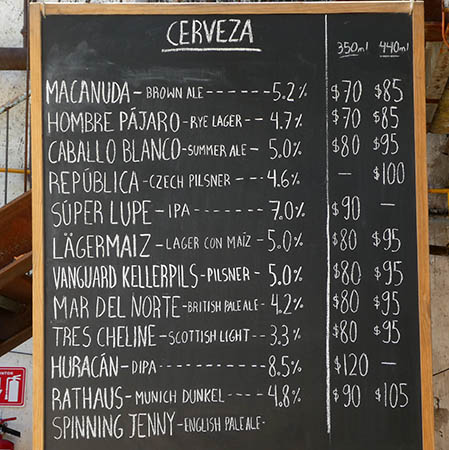 Chalkboard listing of beers available Hercules Cerveceria, Queretaro City, Mexico