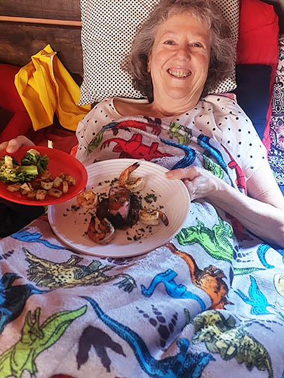 Eating gourmet food while sick in bed