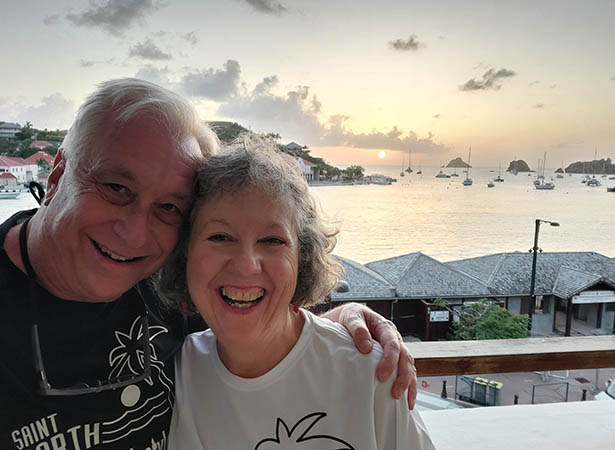 Senior couple on veranda at Sunset Hotel, St. Barth