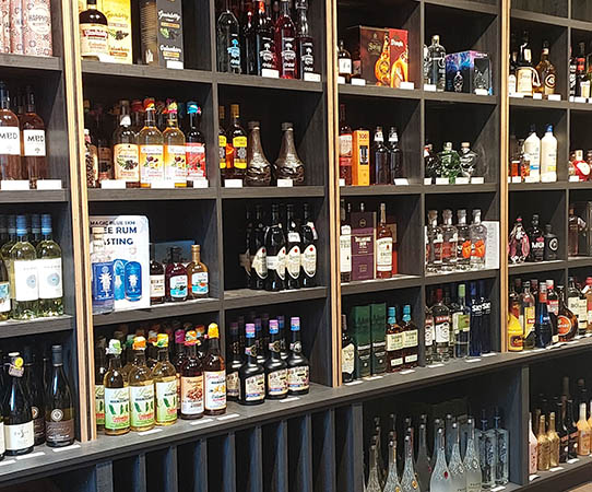 stockpile of rums, cognacs bourbons, whiskeys, gins, vodkas and wines, Dutch Cheese and Liquor store, Philipsburg, Sint Maarten