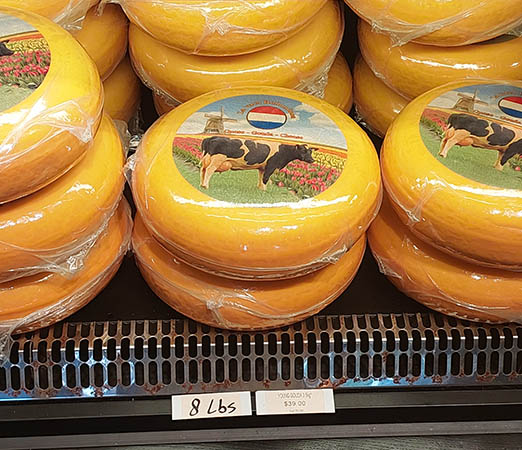 8 lb. rounds of wrapped Gouda, Amsterdam Cheese and Liquor Store, Philipsburg, Sint Maarten