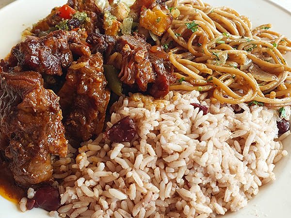 oxtail soup, red beans and rice, flavored noodles at Sheika's Bistro, St Maarten