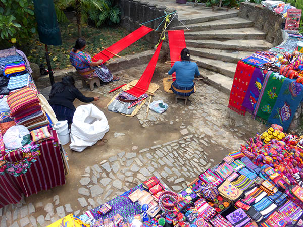 Mayans weaving and selling their wares