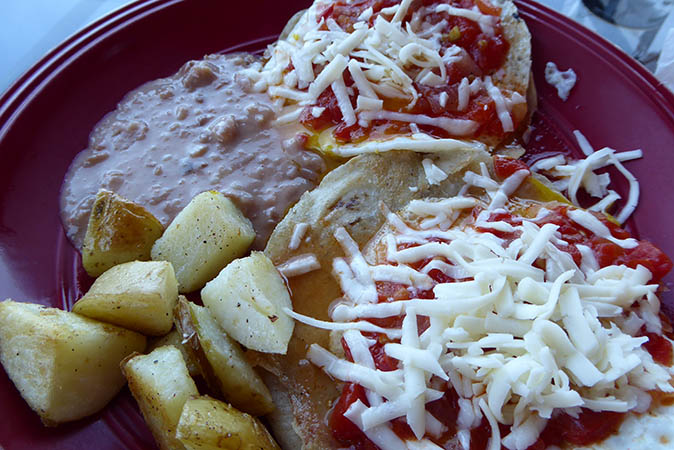Huevos Rancheros with country fried potatoes