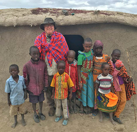 Dale with children in Kenya