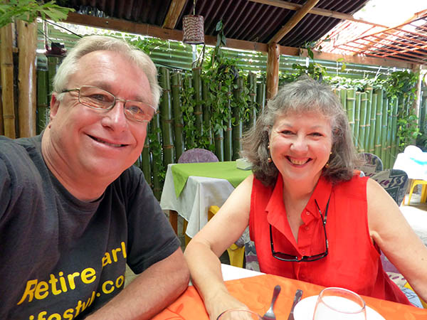 Billy and Akaisha in a tropical restaurant
