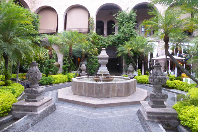 The garden entrance with fountain
