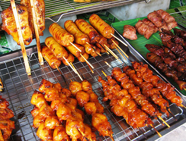 Grilled sausages, chicken and organ meats, Bangkok, Thailand