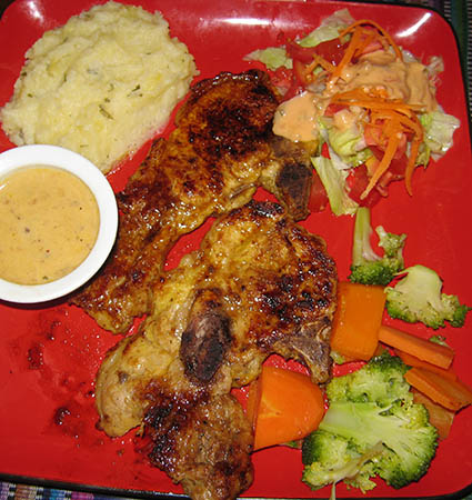 A full chicken meal At Patti's in Corozal, Belize