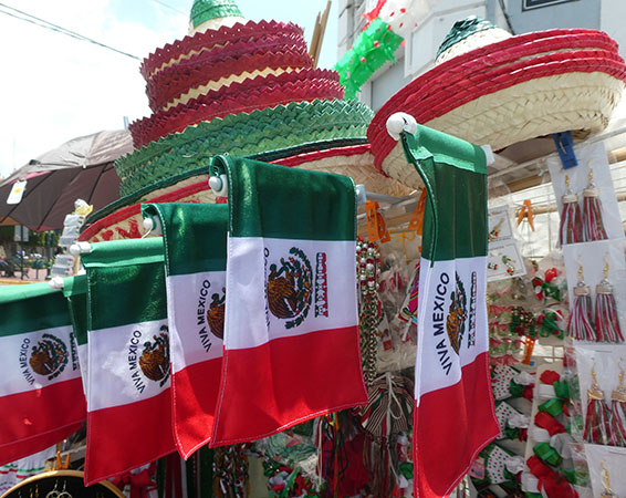 Mexico's flag, hats, tassels and more on sale Tepatitlan, Mexico