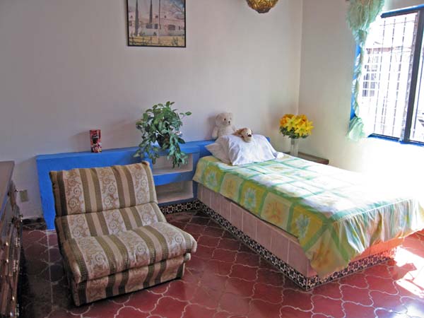 A brightly lit smaller room for an Alzheimers patient.