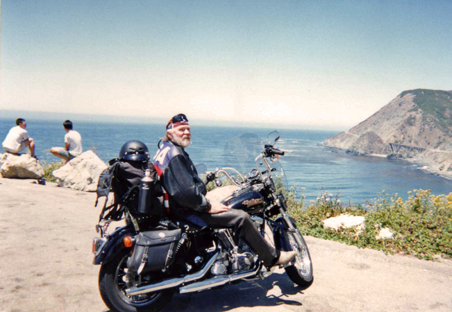 Bernie with his bike on one of his many motorcycle trips