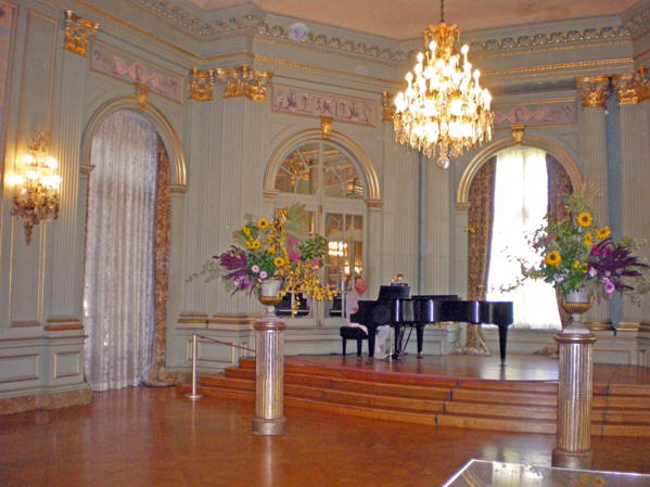 Crystal chandeliers and gilded archways in the Ballroom. Filoli gardens, Woodside, California