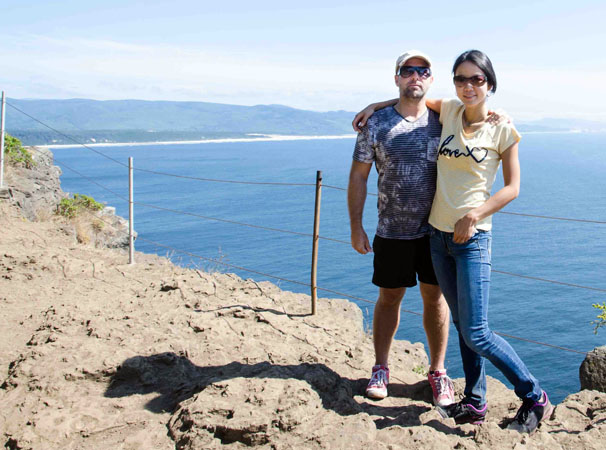 Jeremy and Winnie hiking along the Oregon coast
