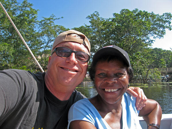 Billy makes a friend on the boat, New River, Belize