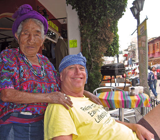 A Mayan woman and Billy pose for a photo in Panajachel, Guatemala