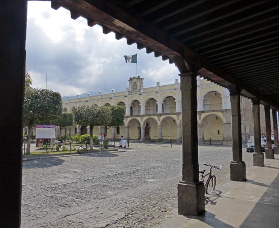 Archways and walkways surround the central plaza